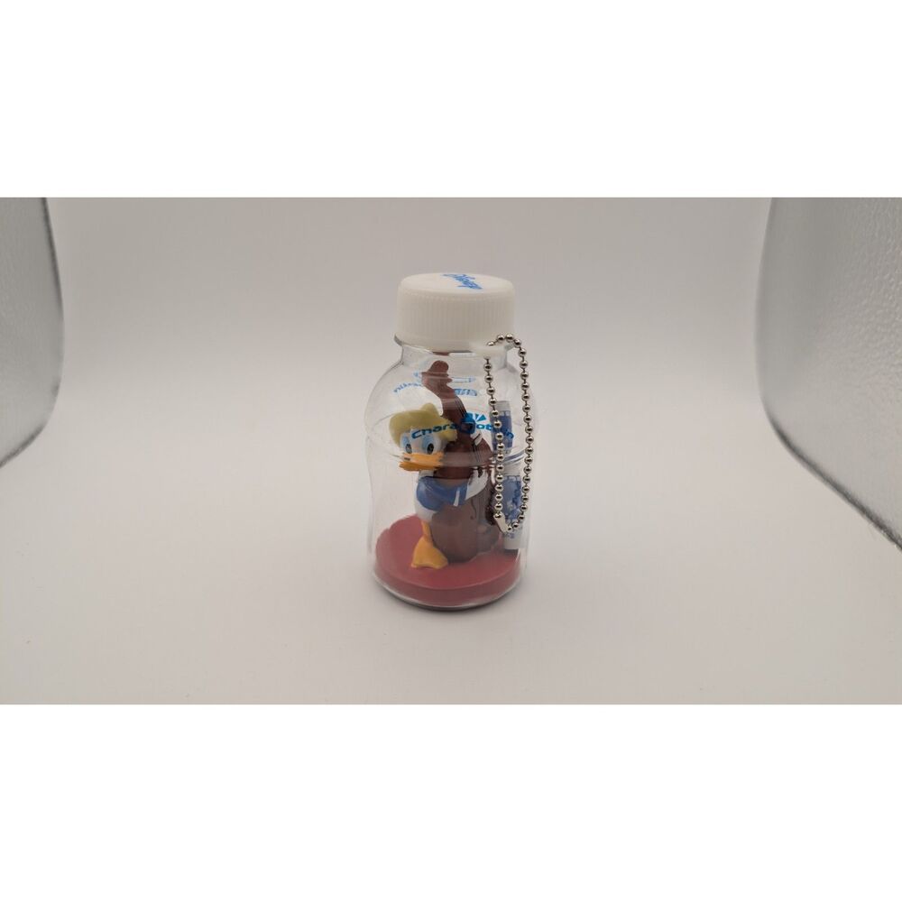 Disney Japan “Chara Bottlin” keychain figure featuring a Donald Duck
